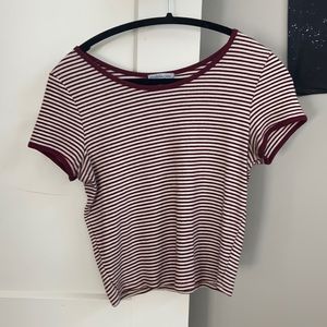 Red and white striped shirt.